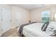 Bedroom featuring a comfortable bed, natural light, and ample space at 705 Hinterland Ln, Matthews, NC 28104