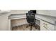 Office space with built-in desk, granite countertops, and ample storage cabinets at 705 Hinterland Ln, Matthews, NC 28104