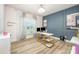 Stylish home office with custom accent wall, modern desk and natural light at 705 Hinterland Ln, Matthews, NC 28104