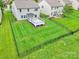 Fenced backyard includes deck, patio and a well-maintained lawn at 7101 Agnew Dr, Charlotte, NC 28273
