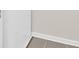 Image shows the tile flooring and base trim details of the interior at 7101 Agnew Dr, Charlotte, NC 28273