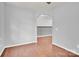 A view of an empty room featuring wood floors and gray walls at 7101 Agnew Dr, Charlotte, NC 28273