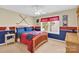 Cozy bedroom featuring a hockey theme with natural light at 7480 Katelyn Ct, Harrisburg, NC 28075