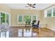 Bonus room with lots of natural light and sliding glass door at 7480 Katelyn Ct, Harrisburg, NC 28075