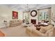 Comfortable living room with a fireplace, neutral tones, and plenty of natural light at 7480 Katelyn Ct, Harrisburg, NC 28075