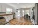 Bright kitchen with granite countertops, stainless steel appliances, and breakfast nook at 7712 Old Waxhaw Monroe Rd, Waxhaw, NC 28173