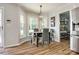 Bright eat-in kitchen with lots of windows and modern lighting at 7712 Old Waxhaw Monroe Rd, Waxhaw, NC 28173
