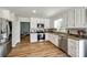 Spacious kitchen with white cabinets, granite countertops, and stainless steel appliances at 7712 Old Waxhaw Monroe Rd, Waxhaw, NC 28173
