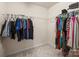 Walk-in closet with ample storage space and organized clothing racks at 8314 Paw Valley Ln, Charlotte, NC 28214