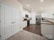 Well-equipped kitchen with stainless steel appliances, white cabinets, and granite countertops at 8314 Paw Valley Ln, Charlotte, NC 28214