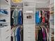 Organized walk-in closet with built-in shelving and ample storage space at 9110 Buckley Ct # 154, Charlotte, NC 28269