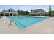 Inviting community pool with lap lanes and a poolside clubhouse for residents enjoyment at 9110 Buckley Ct # 154, Charlotte, NC 28269