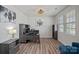 Well-lit home office space with wood-look floors and modern decor at 9110 Buckley Ct # 154, Charlotte, NC 28269