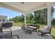 Covered patio with comfortable seating and outdoor furniture, perfect for entertaining and relaxation at 9110 Buckley Ct # 154, Charlotte, NC 28269