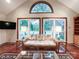 Bright living room features vaulted ceiling, large windows offering abundant natural light at 965 Hunting Ave, Lincolnton, NC 28092