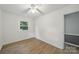 Bedroom featuring wood floors, natural light and neutral decor at 9818 Starwood Dr, Charlotte, NC 28215