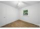 Bedroom featuring wood floors, natural light and neutral decor at 9818 Starwood Dr, Charlotte, NC 28215