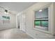 The dining area features direct access to the kitchen and views of the outdoor space at 9818 Starwood Dr, Charlotte, NC 28215