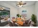 The dining room is finished with modern decor, a wooden table, and space for six at 9818 Starwood Dr, Charlotte, NC 28215