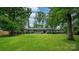 Well-maintained home with a large front yard and mature trees at 1035 15Th Nw Ave, Hickory, NC 28601