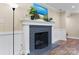 Close-up of a painted fireplace with a decorative mantel and hearth at 1035 15Th Nw Ave, Hickory, NC 28601