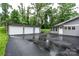 Spacious three-car detached garage with paved driveway at 1035 15Th Nw Ave, Hickory, NC 28601