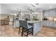Kitchen with gray cabinets, granite countertops, eat-in island and stainless steel appliances at 1035 15Th Nw Ave, Hickory, NC 28601