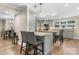 Gorgeous kitchen with gray cabinets, granite countertops, stainless steel appliances, and eat-in island at 1035 15Th Nw Ave, Hickory, NC 28601