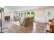 Comfortable living room with an adjacent dining area and large windows that offer ample natural light at 1035 15Th Nw Ave, Hickory, NC 28601