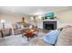 Inviting living room featuring a painted fireplace and comfortable seating at 1035 15Th Nw Ave, Hickory, NC 28601