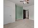 Cozy bedroom featuring plush carpeting, calming wall colors, two closets, and a ceiling fan for comfort at 1035 Ivey Ct, Indian Land, SC 29707