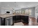 Open concept kitchen with stainless steel appliances and granite countertops at 1035 Ivey Ct, Indian Land, SC 29707