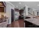 Well-equipped kitchen featuring modern appliances, granite countertops, and a gas stove at 1035 Ivey Ct, Indian Land, SC 29707