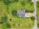 Aerial shot of the house showcasing large yard and driveway with two vehicles parked at 105 Gold Run Ct, Kings Mountain, NC 28086