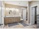 Bright bathroom features a double sink vanity and shower with decorative tile and neutral color scheme at 105 Gold Run Ct, Kings Mountain, NC 28086