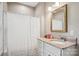 Bathroom with white vanity, marble countertop and shower with a curtain at 105 Gold Run Ct, Kings Mountain, NC 28086
