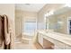 Bright bathroom with double vanity, soaking tub and seamless glass shower at 105 Prairie Rose Ct, Waxhaw, NC 28173