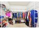 Well-organized walk-in closet featuring ample shelving and storage for clothes and shoes at 105 Prairie Rose Ct, Waxhaw, NC 28173