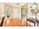 Inviting foyer showcasing hardwood floors, neutral walls, and elegant decor at 105 Prairie Rose Ct, Waxhaw, NC 28173