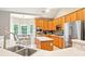 Kitchen boasts stainless steel appliances, breakfast nook, and ample cabinet space at 105 Prairie Rose Ct, Waxhaw, NC 28173