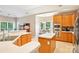 Eat-in kitchen features stainless steel appliances, breakfast nook, and tile flooring at 105 Prairie Rose Ct, Waxhaw, NC 28173