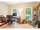 Home office with lots of natural light and built-in cabinets at 105 Prairie Rose Ct, Waxhaw, NC 28173