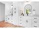 Elegant bathroom featuring dual vanities with marble countertops and modern fixtures at 106 Arbor Dr, Waxhaw, NC 28173