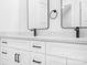 Elegant bathroom with dual sinks, quartz countertops, and sleek black fixtures creating a spa-like retreat at 106 Arbor Dr, Waxhaw, NC 28173