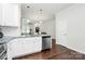Modern kitchen with stainless steel appliances and a view into the dining area at 109 Mac Aly, Cramerton, NC 28032