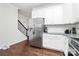 Bright kitchen with stainless steel fridge and granite countertops at 109 Mac Aly, Cramerton, NC 28032