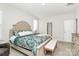 Comfortable main bedroom with ensuite features a queen bed, neutral walls, and updated dresser at 109 Mac Aly, Cramerton, NC 28032