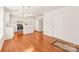 Open view of a spacious kitchen with white cabinets, stainless steel appliances, and a central island at 114 Sardis Plantation Dr, Matthews, NC 28105