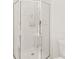 Bathroom featuring a shower with glass doors and white tile surround at 114 Sardis Plantation Dr, Matthews, NC 28105