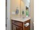 Bathroom with vanity and a large mirror and a neutral color scheme at 11607 Meetinghouse Dr, Cornelius, NC 28031